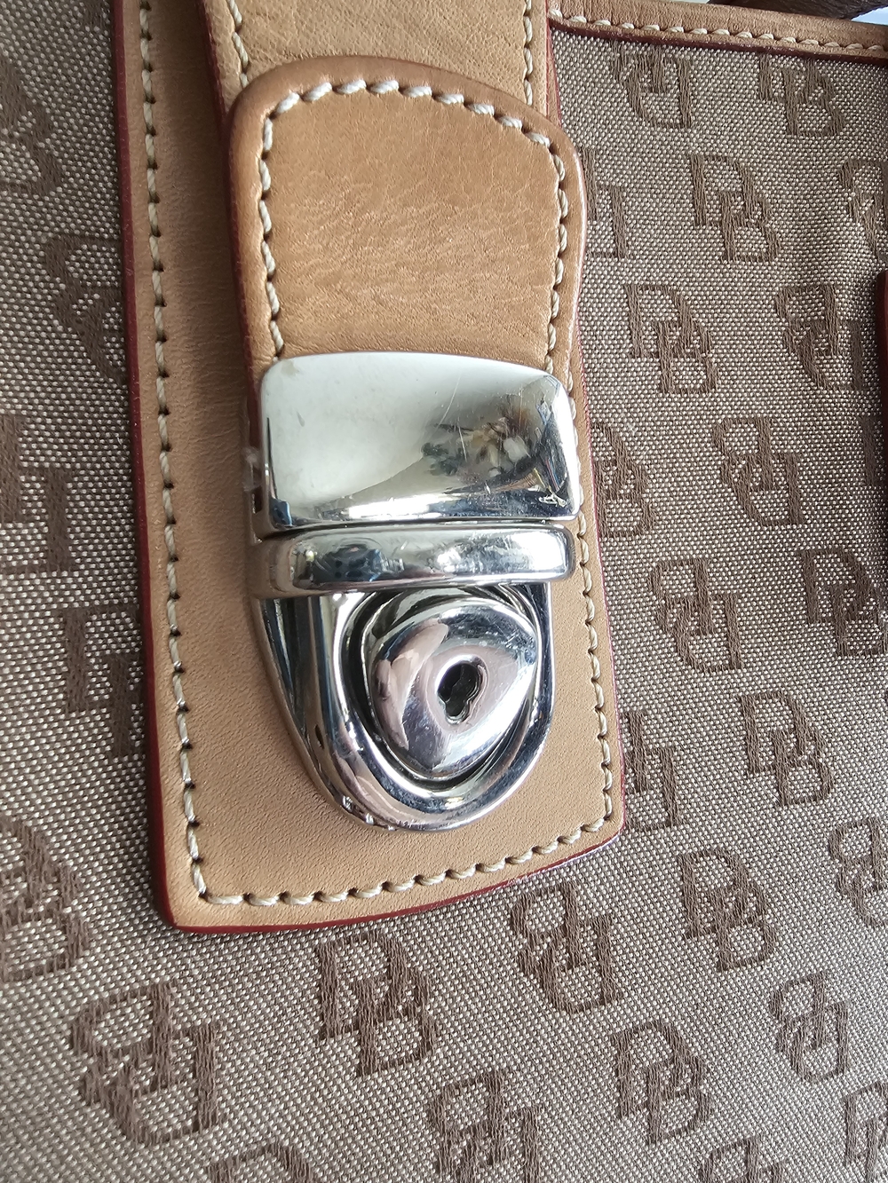 Dooney & Bourke Tan Monogram Tote with Leather Trim and Silver-Tone Lock,callout - Picture 3 of 8